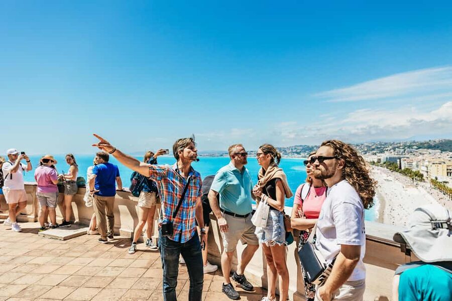 Nice: Old Town & Castle Hill Informative Guided Walking Tour - Place Massena and its red Piedmontese facades
