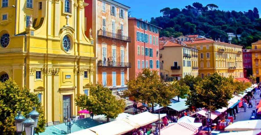 Nice: Old Town Treasures Walking Tour - Entering Vieux-Nice through an old Italian doorway