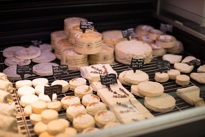 Nice Small-Group Walking Food Tour with Local Specialties & Wine Tasting - Olive oil, cheese, and wine make the tour more than a snack crawl